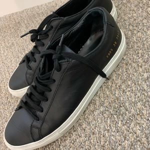 WOMAN by COMMON PROJECTS black sneakers